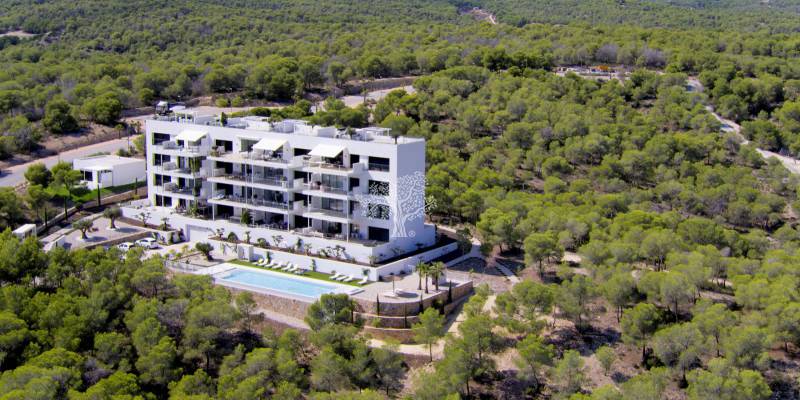 Enjoy idyllic sea and mediterranean forest views from our luxury penthouse for sale in Las Colinas Golf
